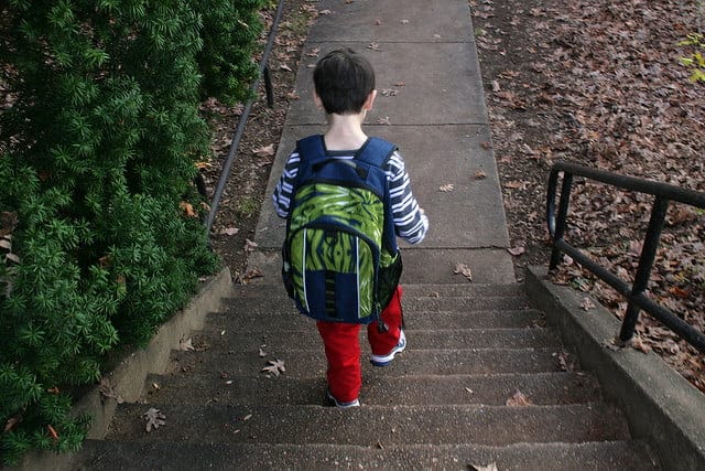 Child wearing backpack